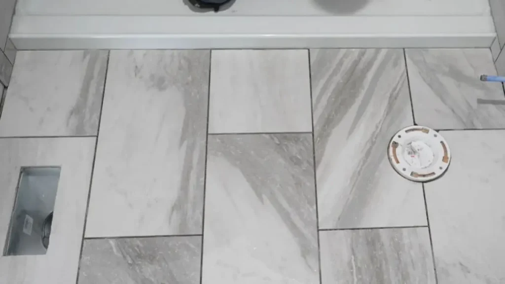 How to Tile Around a Sloped Floor Drain