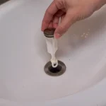 how to remove plug from bathroom sink