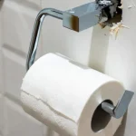 repair drywall toilet paper holder