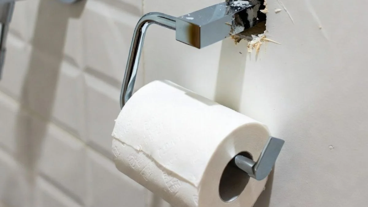 repair drywall toilet paper holder