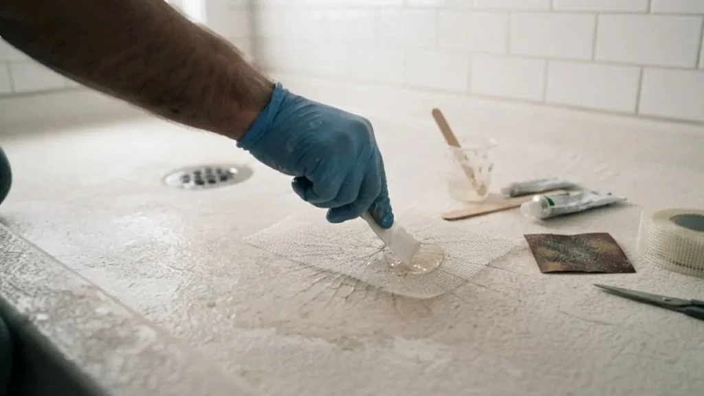 applying fiberglass repair kit shower crack