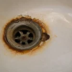 bathtub drain rust hole repair