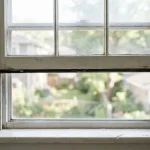 double hung window top sash won't stay up