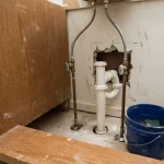 replacing bathroom vanity floor plumbing